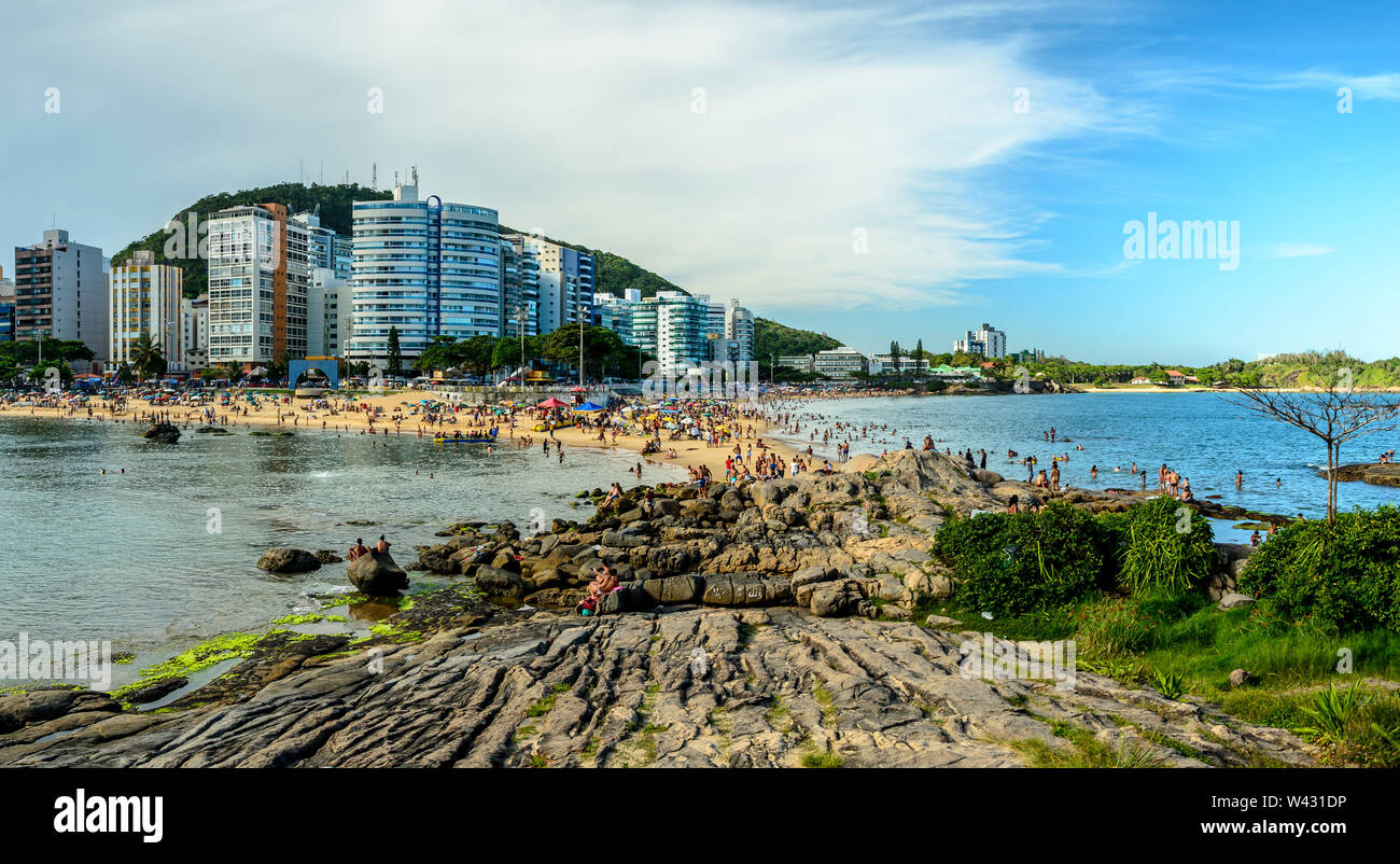 VILA VELHA, BRAZIL - DECEMBER 25th ,2016 ; Tourists on a crowded Costa and Mermaid  Beach in Vila Velha, state of Espirito Santo , Brazil. Stock Photo