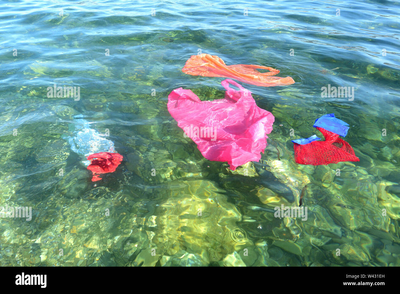 plastic bags floating in the sea Stock Photo Alamy