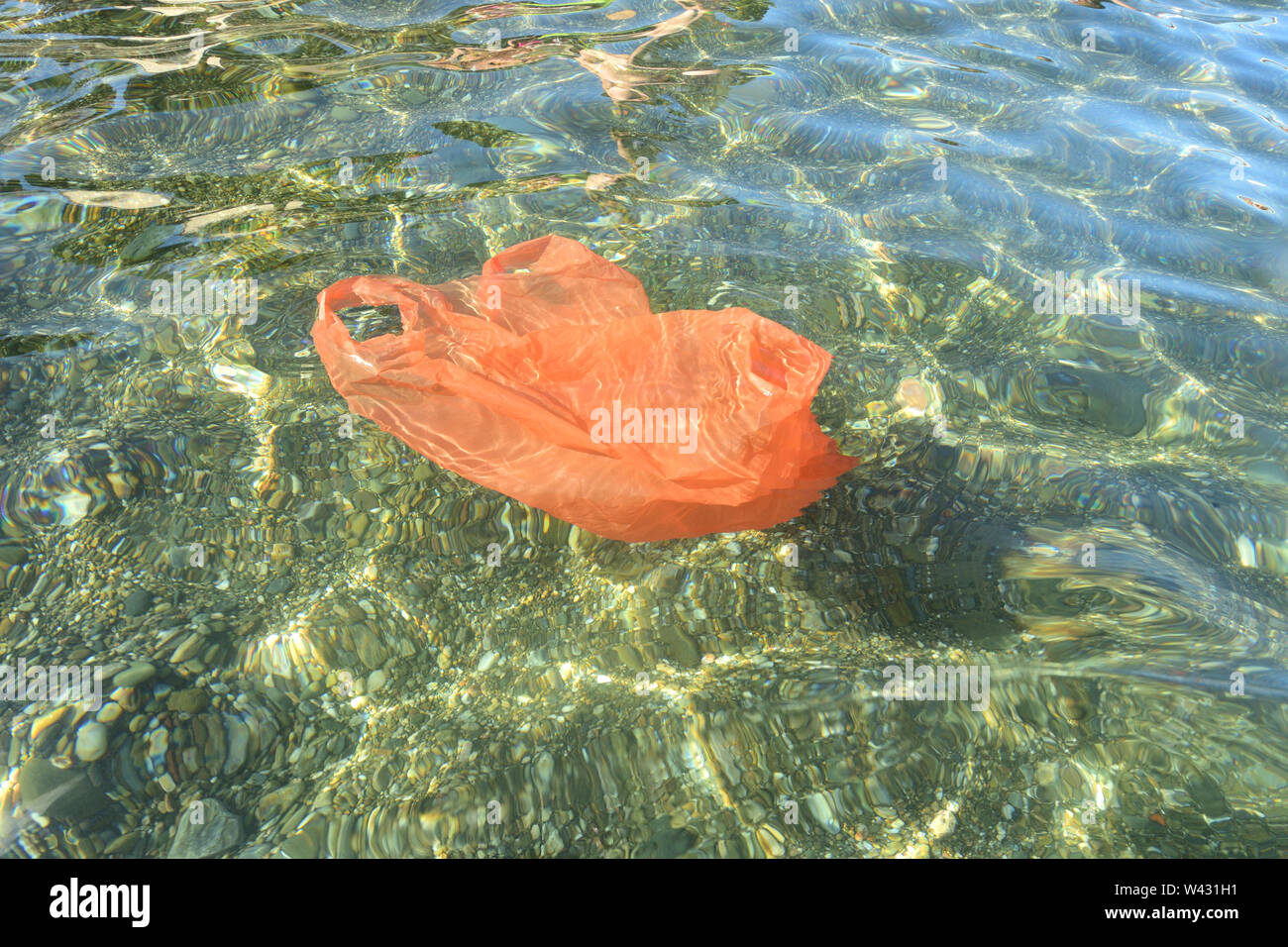 plastic bag floating in the sea Stock Photo Alamy
