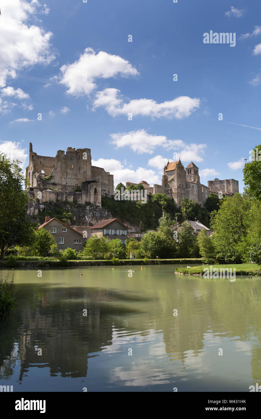 Chauvigny, France. A lake in a public garden with the Baronial Castle ruins, Donjon de Gouzon and Chateau d’Harcourt in the background. Stock Photo