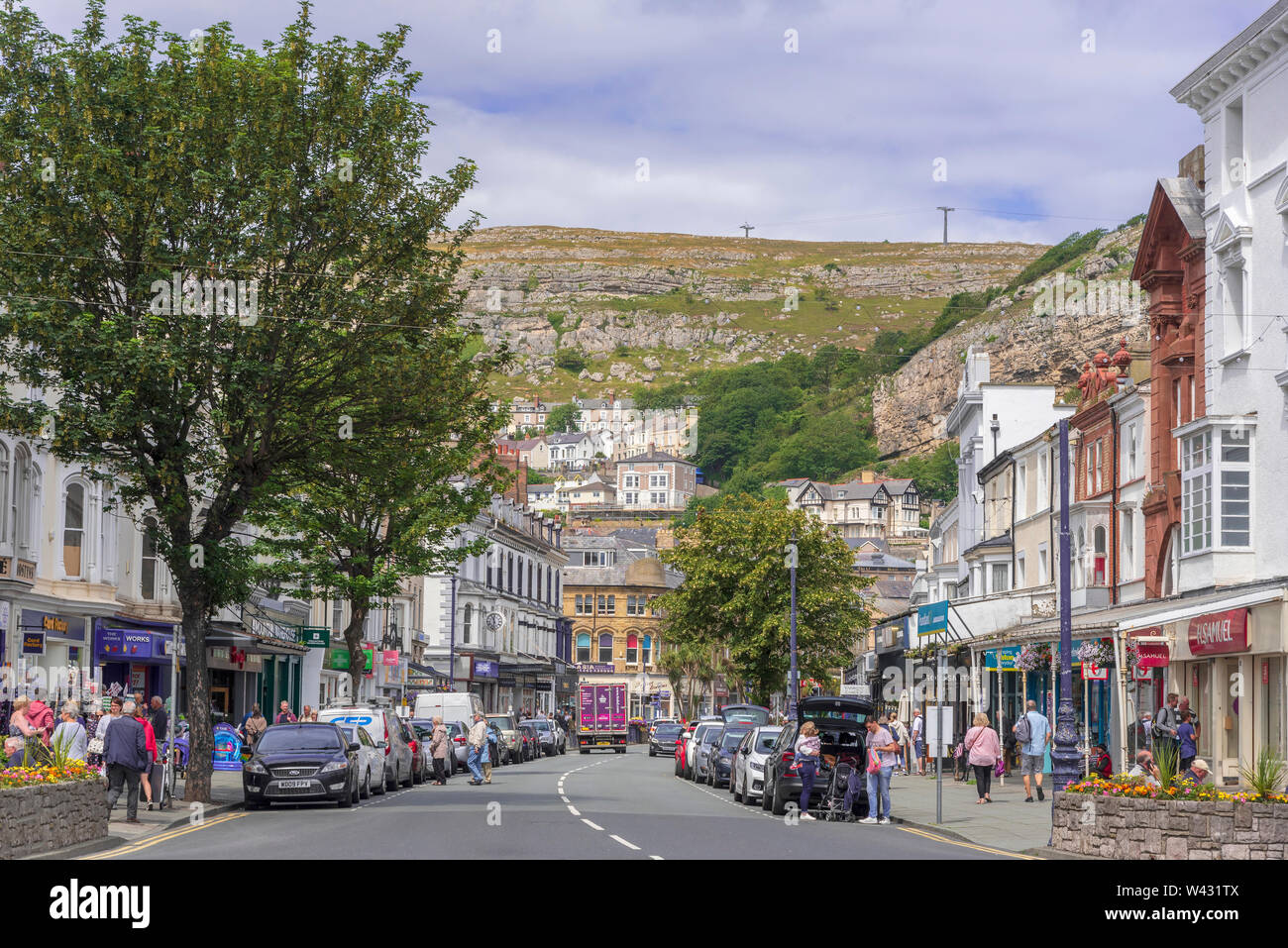 Mostyn street in the centre of Llandudno with the Great Orme backdrop