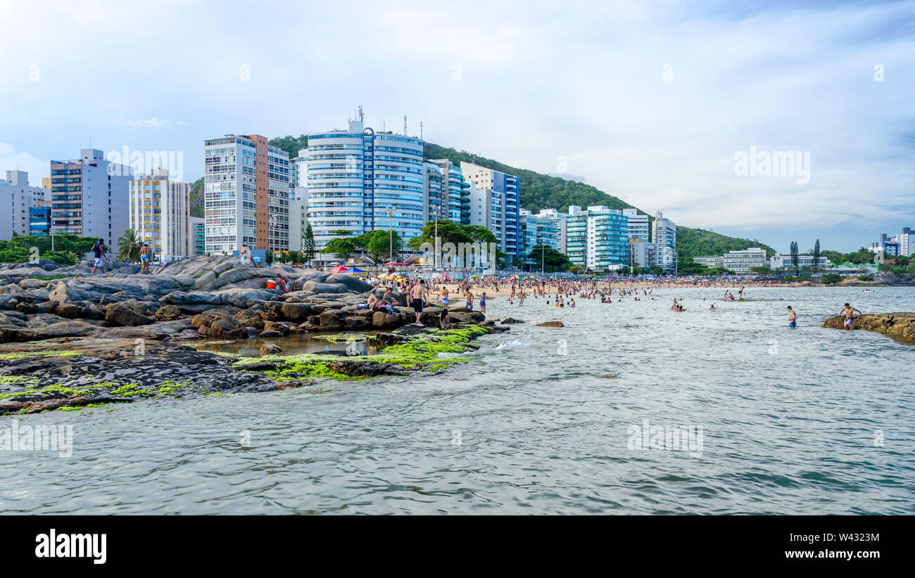 VILA VELHA, BRAZIL - DECEMBER 25th ,2016 ; Tourists on a crowded Mermaid  Beach in Vila Velha, state of Espirito Santo , Brazil. Stock Photo
