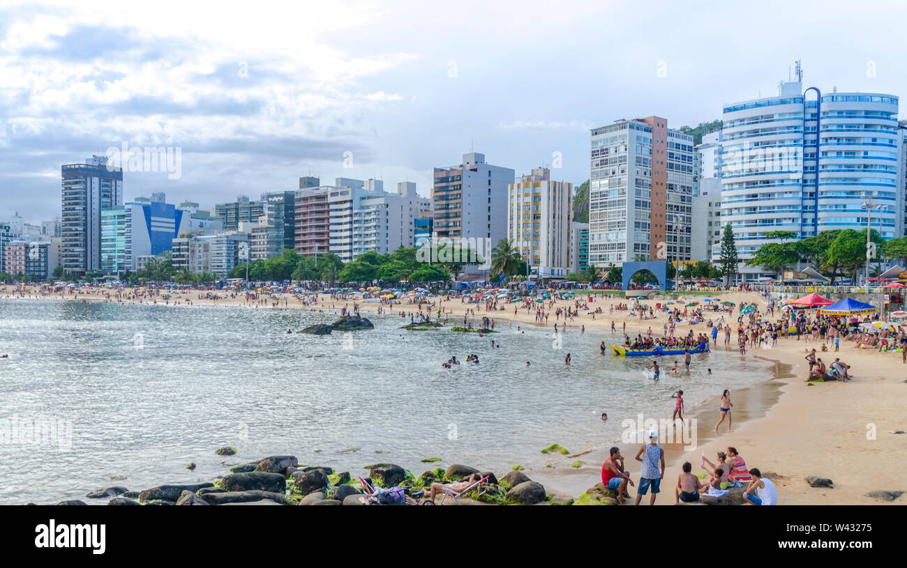 VILA VELHA, BRAZIL - DECEMBER 25th ,2016 ; Tourists on a crowded Costa  Beach in Vila Velha, state of Espirito Santo , Brazil. Stock Photo