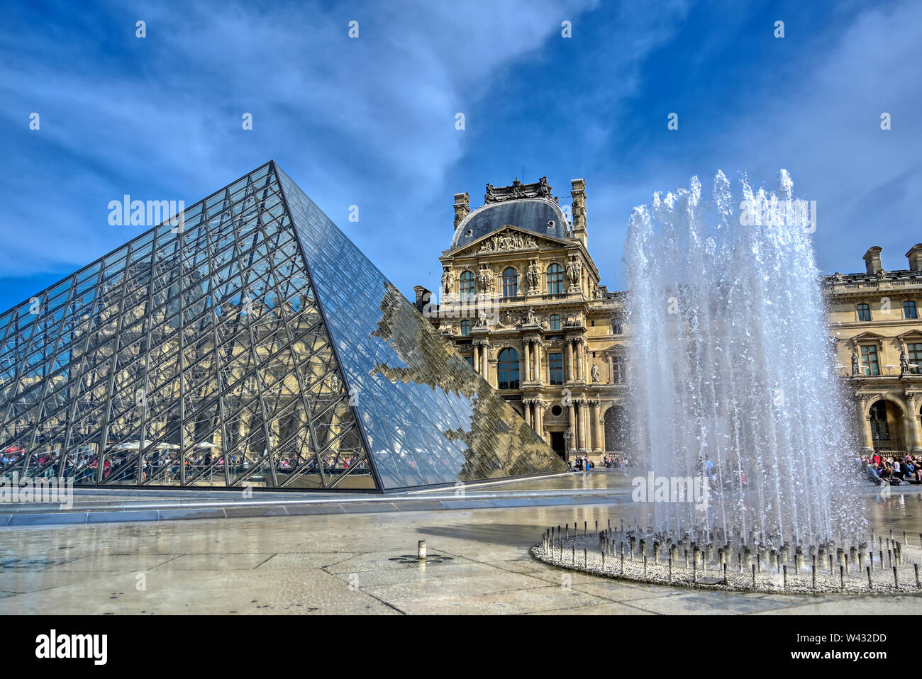 Paris, France - April 21, 2019 - A view of the Louvre Museum, the world's largest art museum and a historic monument in Paris, France, on a sunny day. Stock Photo