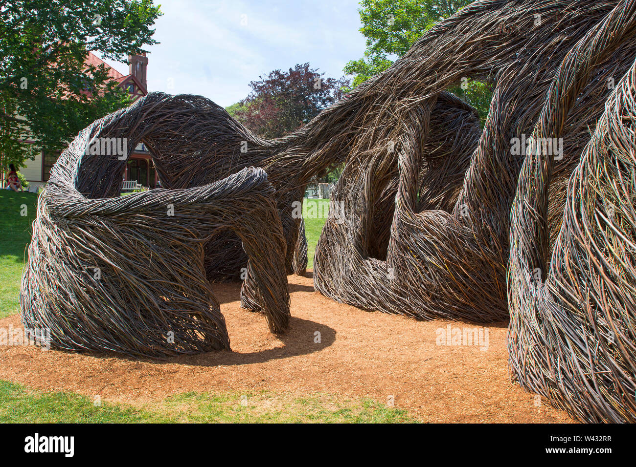 'Stickwork' a sculpture by artist Patrick Dougherty on display at Highfield, a historic summer mansion in Falmouth, Massachusetts on Cape Cod. Stock Photo