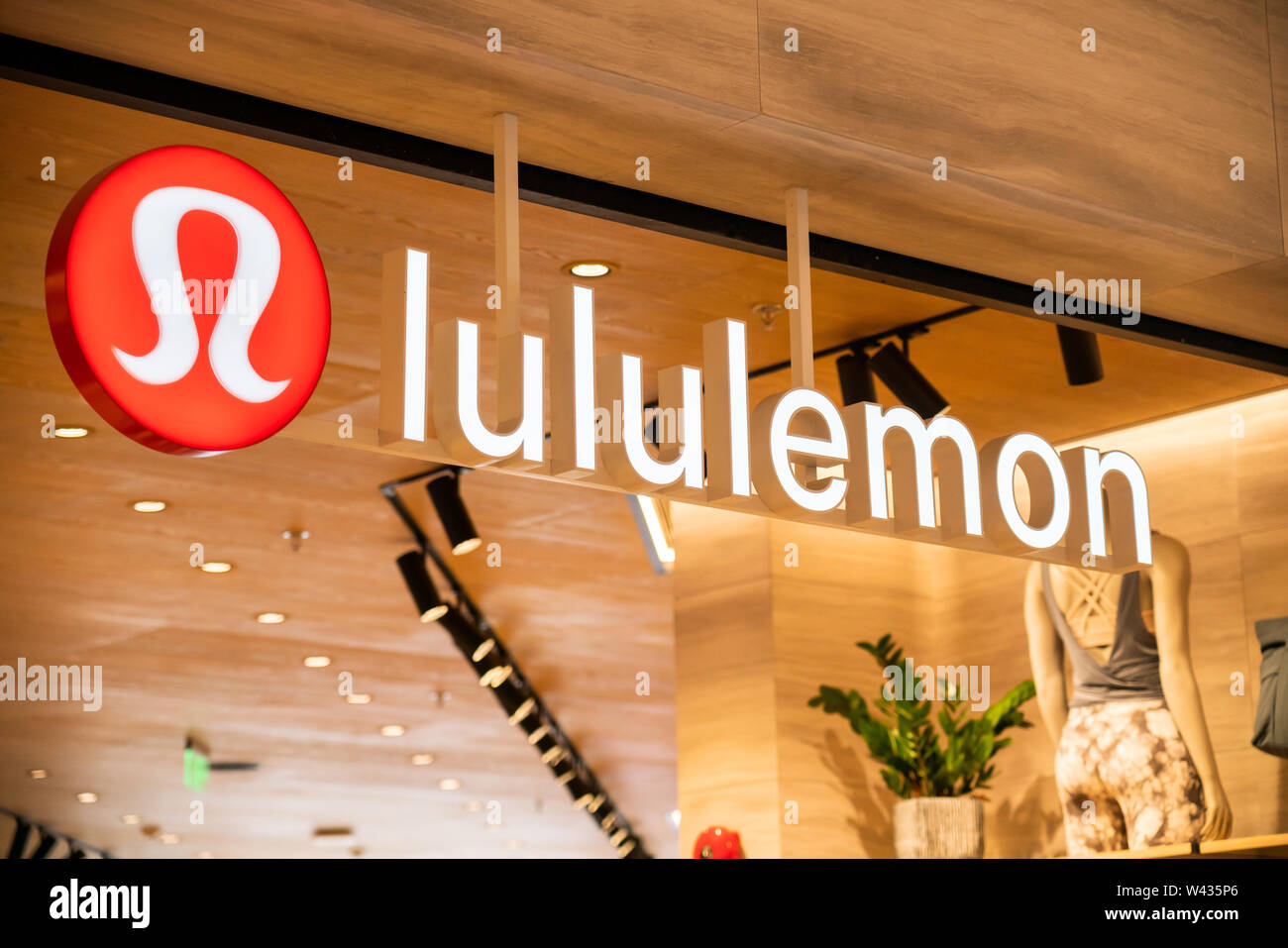 Canadian athletic apparel retailer, Lululemon logo seen in