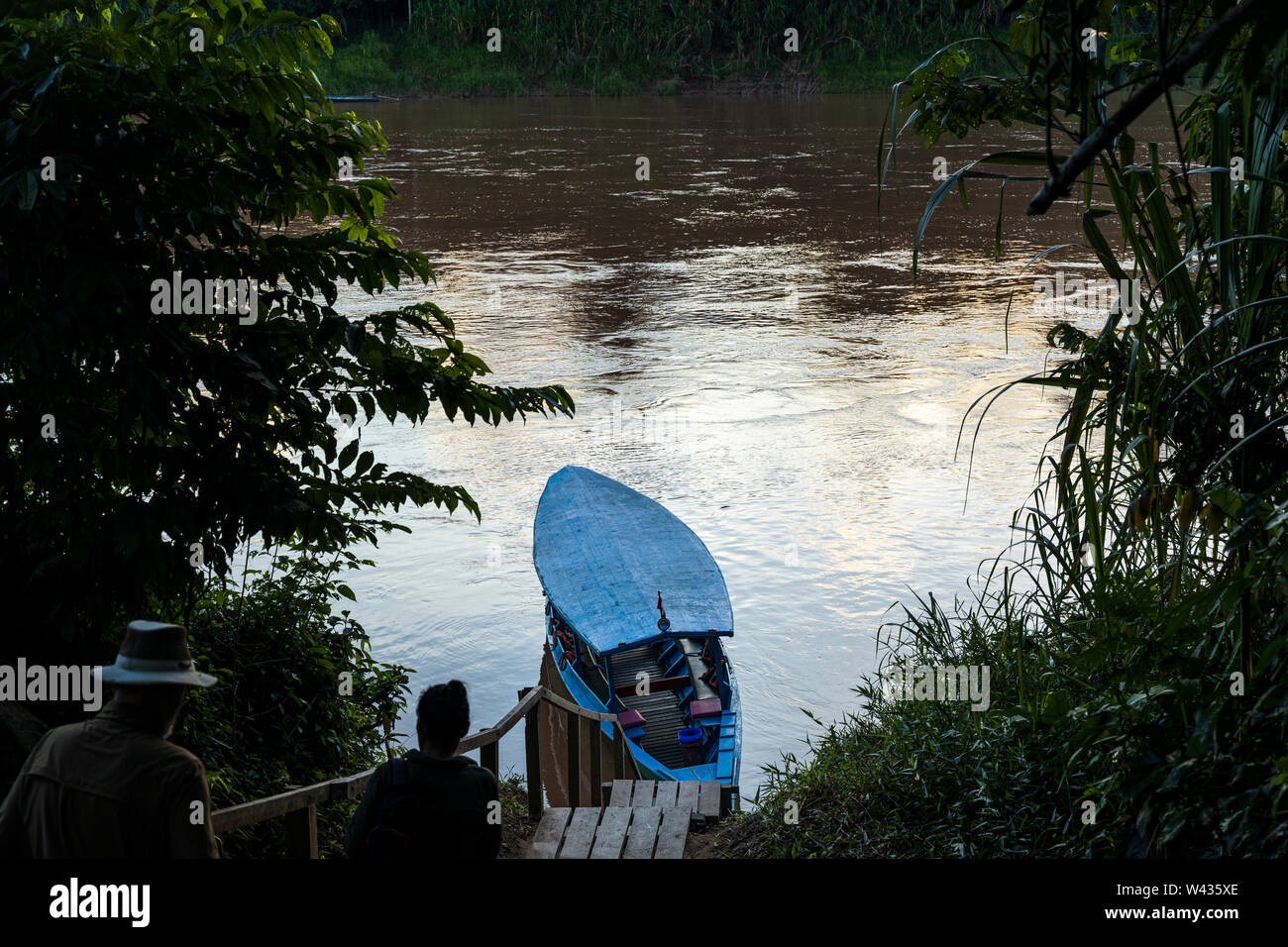 Boat on the river Tambopata, Amazonia, Peru, South America Stock Photo