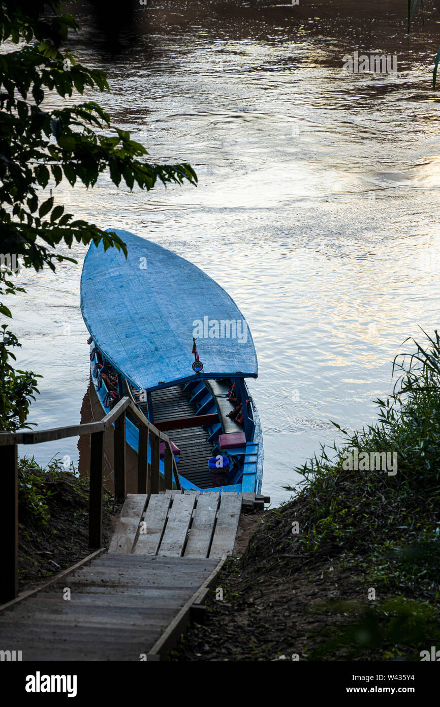 Boat on the river Tambopata, Amazonia, Peru, South America Stock Photo