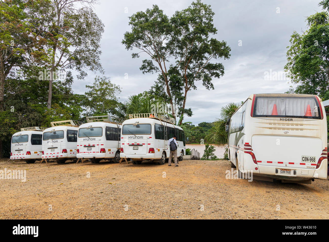 Bus and coach park at the port on the river Tambopata, Amazonia, Peru, South America Stock Photo