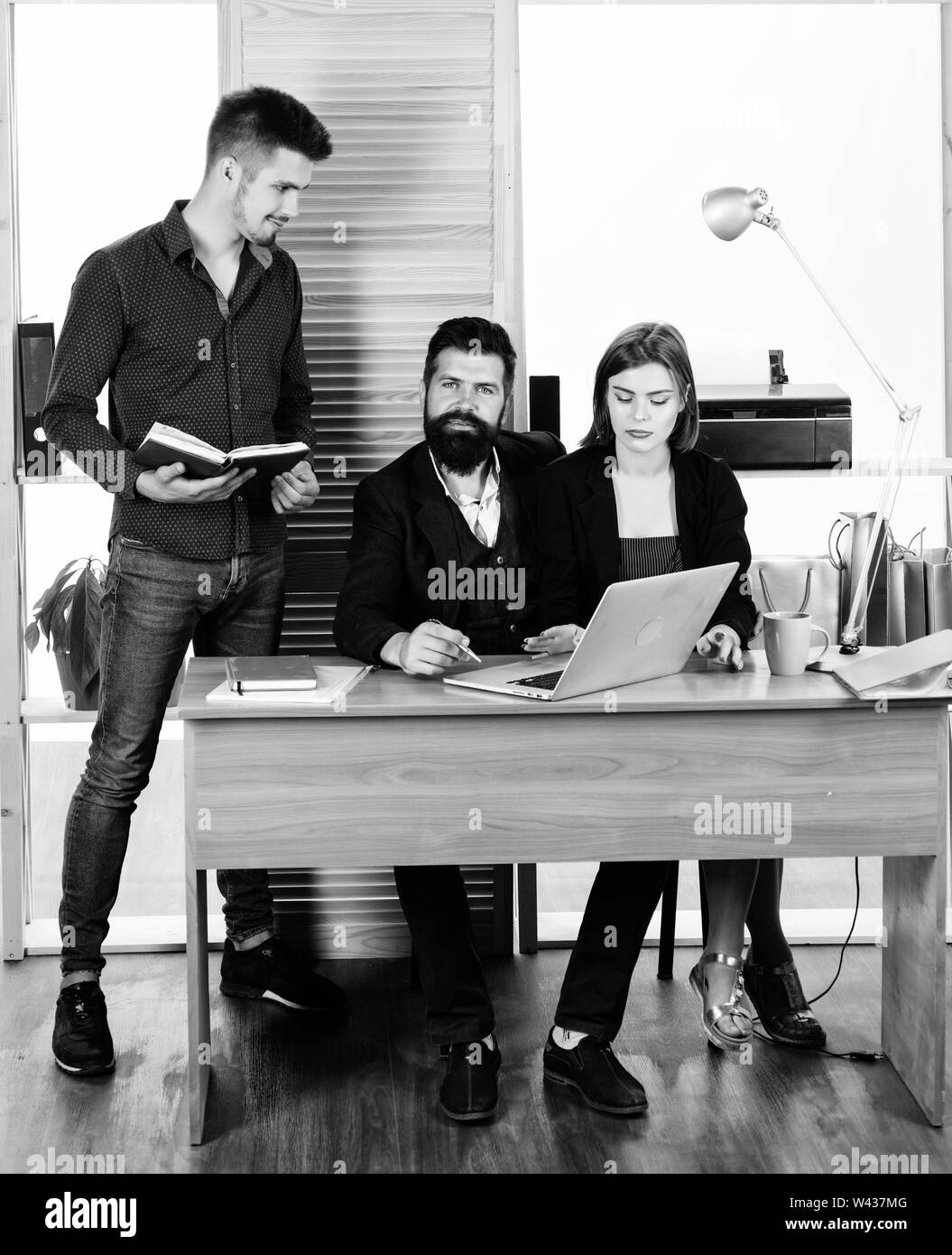 Business first. Managers leading informal business meeting. Group of