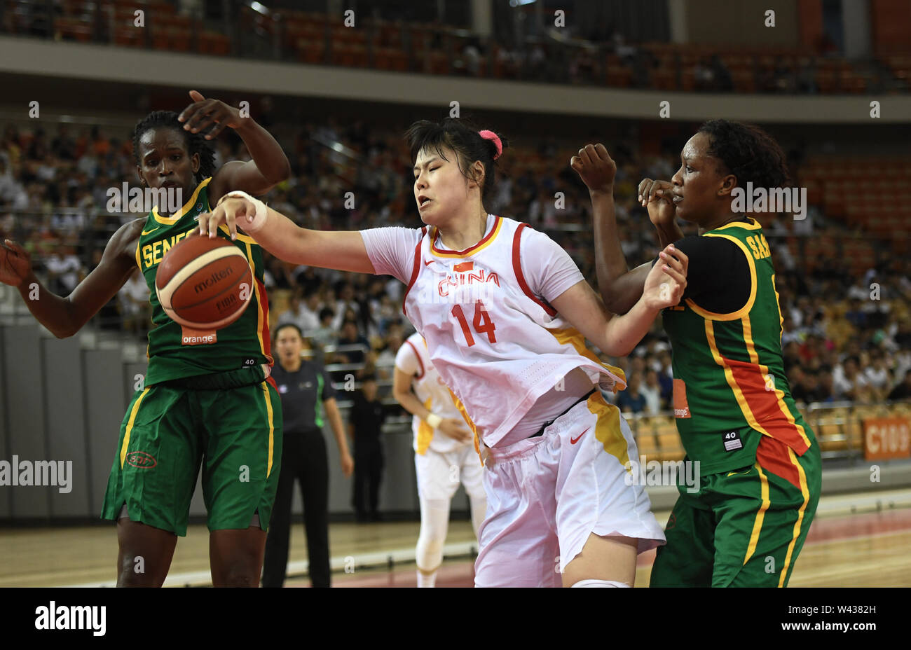 Wuhan. 19th July, 2019. Li Yueru (C) of China competes during 2019 International Women's Basketball Chanllenge between China and Senegal in Wuhan, central China's Hubei Province on July 19, 2019. Credit: Cheng Min/Xinhua/Alamy Live News Stock Photo