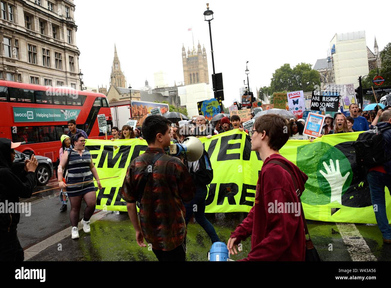 Students took to the streets to demonstrate against climate change in central London on Friday 19th July. Stock Photo