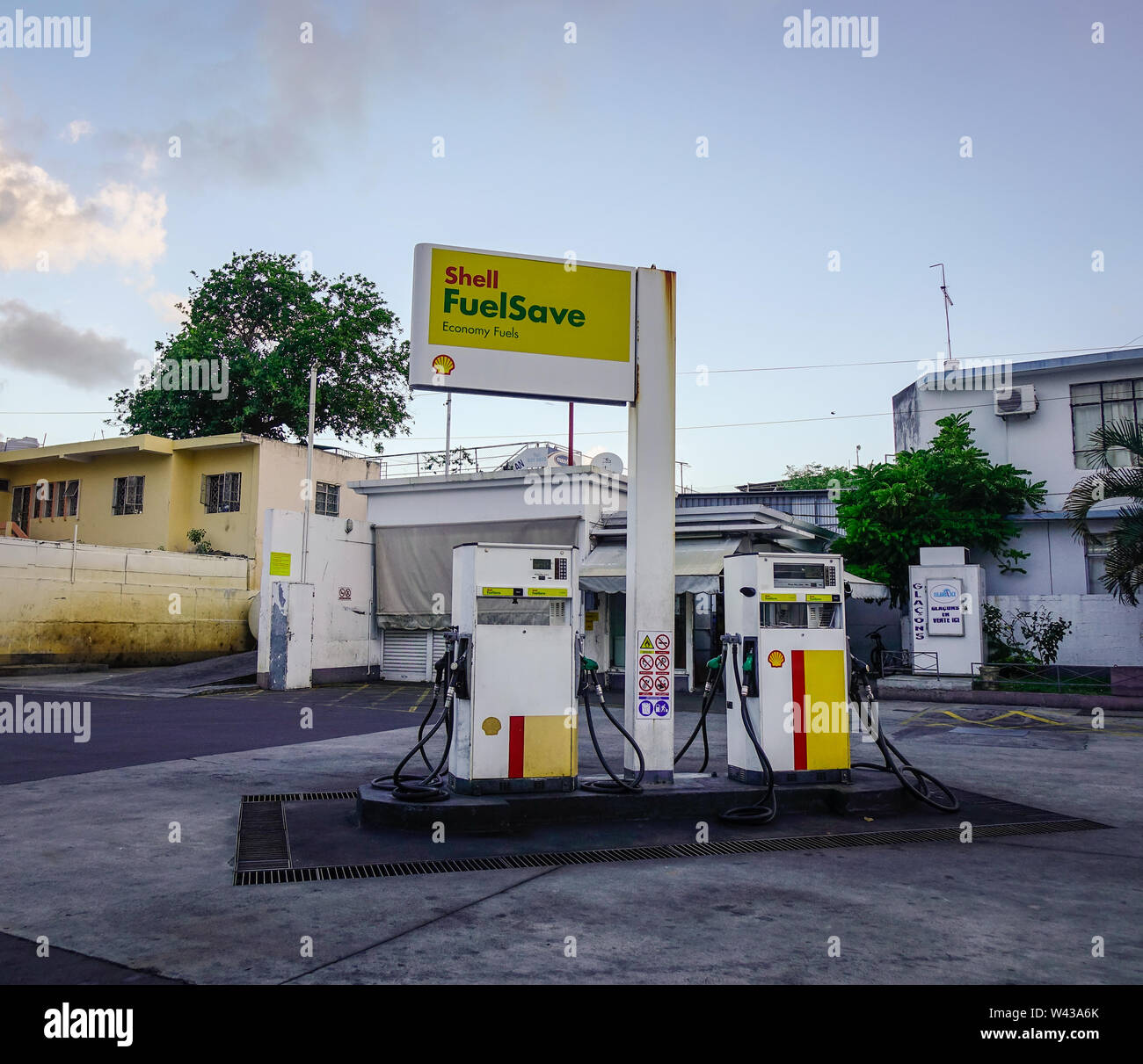 Mahebourg, Mauritius - Jan 5, 2017. Abandoned gasoline station in Mahebourg, Mauritius. Mahebourg is a small city on the south-eastern coast of Maurit Stock Photo