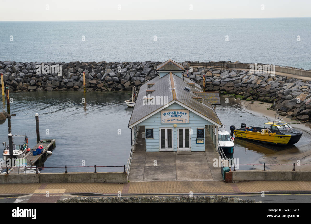 Ventnor Haven Fishery seafood restaurant and wholesaler, situated in a tiny harbour on seafront in Ventnor, Isle of Wight, England, UK Stock Photo