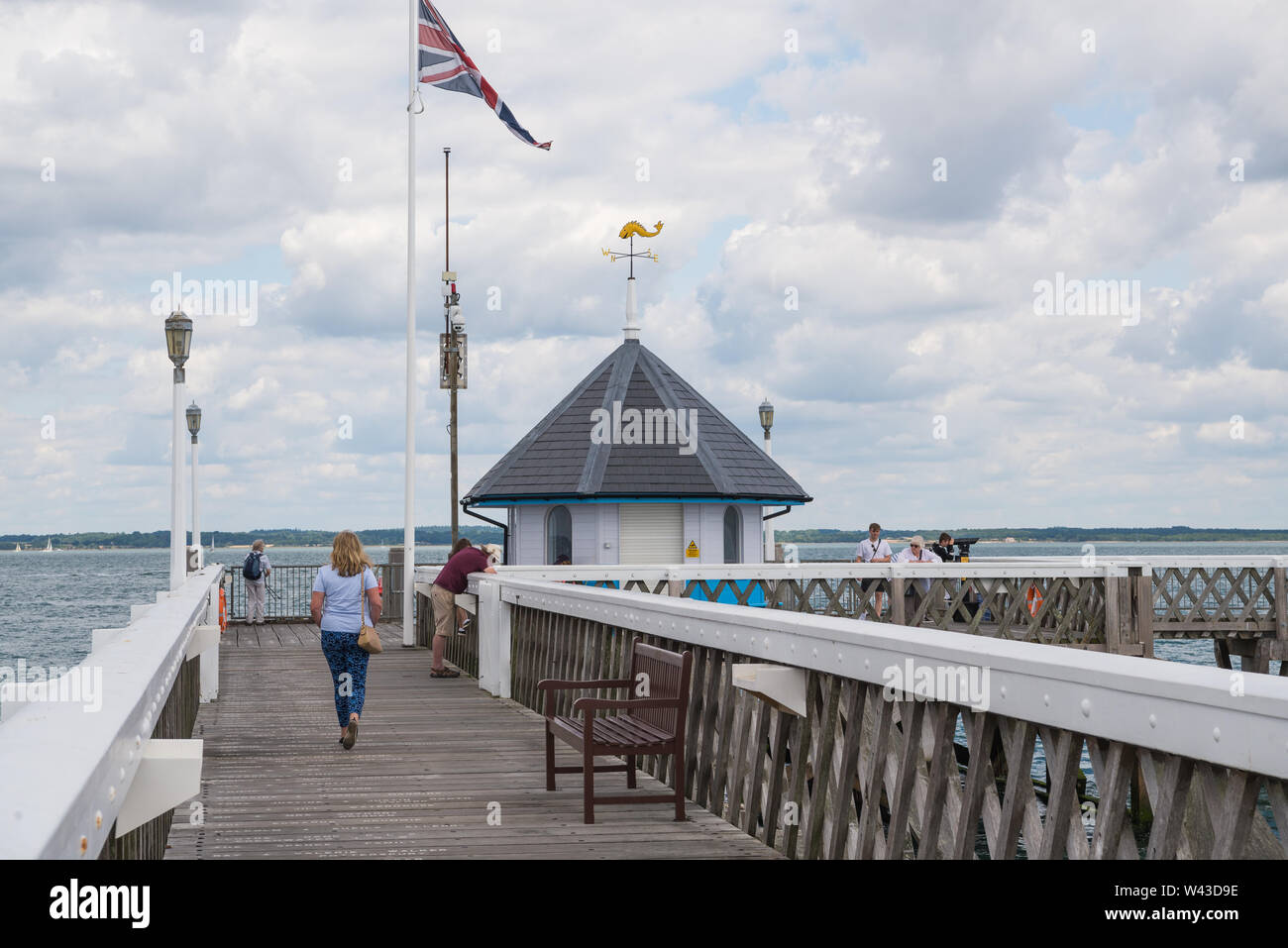 People on Yarmouth pier, Isle of Wight, England, UK Stock Photo