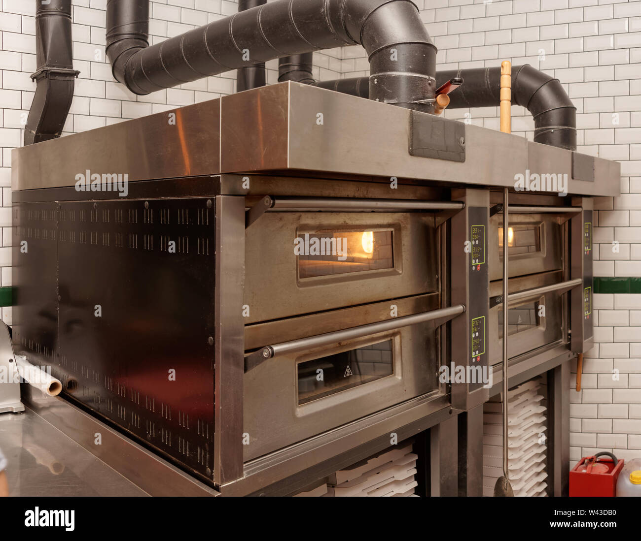Large industrial pizza oven in restaurant Stock Photo Alamy