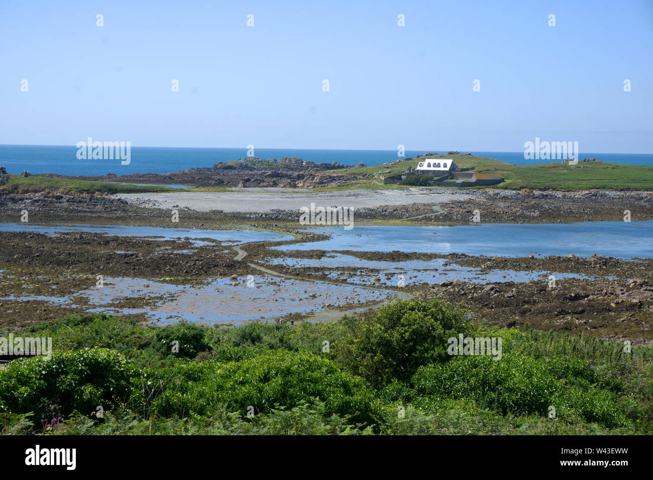 Looking across to Lihou Island, Guernsey, Channel Islands Stock Photo