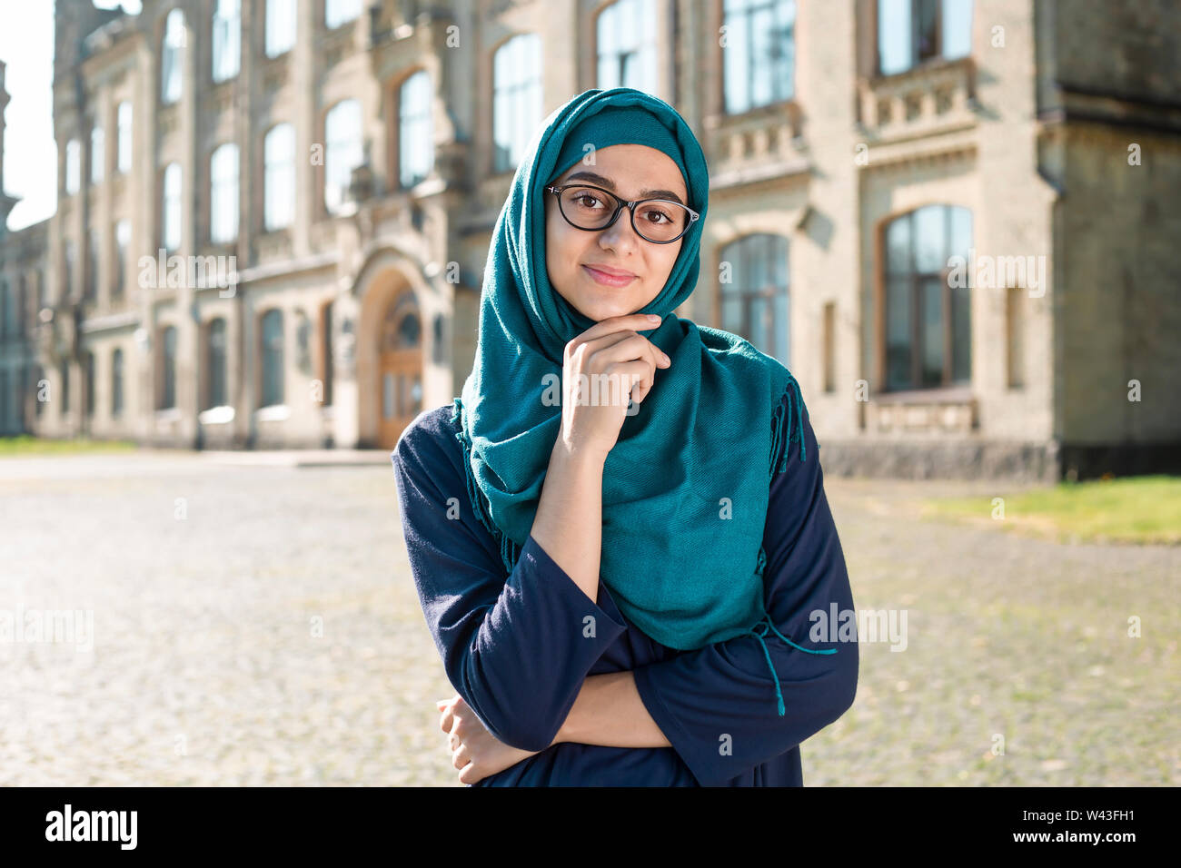 Portrait of muslim female student girl in hijab. Stock Photo