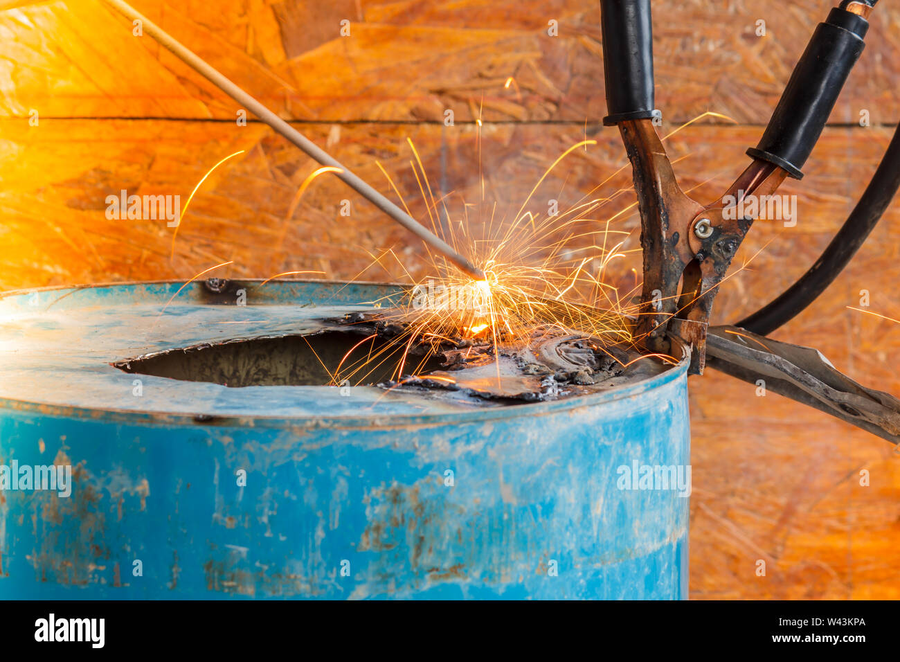 Spark light with welding Process with blue tube metal and bright sparks in steel Stock Photo Alamy