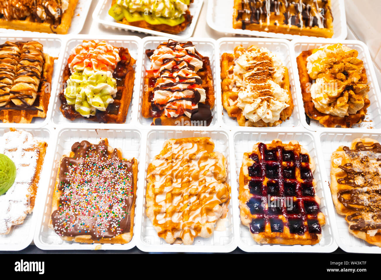 Traditional belgian waffles with fresh fruit and whipped cream Stock ...