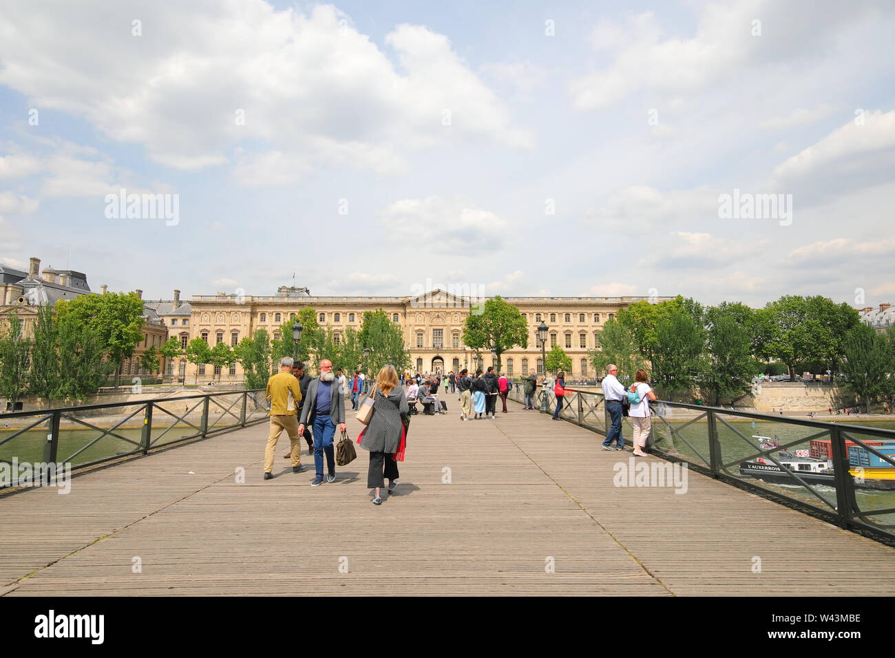People visit Pont des Arts bridge Paris France Stock Photo - Alamy