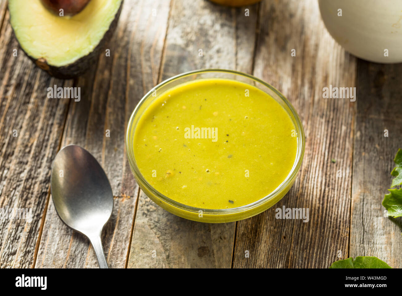 Raw Green Organic Avocado Green Goddess Dressing for Salad Stock Photo