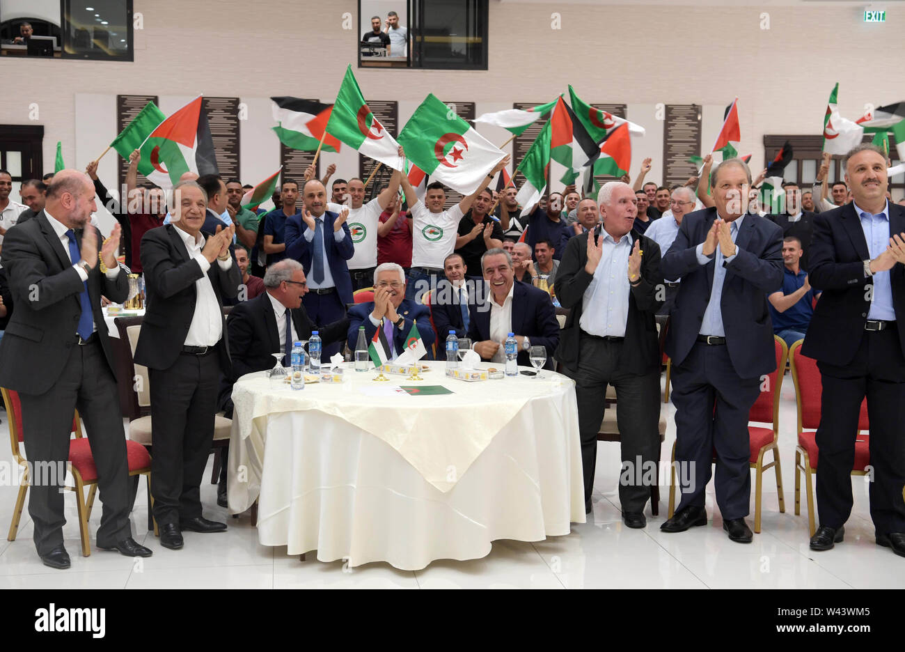 Ramallah, West Bank, Palestinian Territory. 19th July, 2019. Palestinian President Mahmoud Abbas watch the 2019 Africa Cup of Nations (CAN) Final football match between Senegal and Algeria, in the West Bank city of Ramallahm on July 19, 2019 Credit: Thaer Ganaim/APA Images/ZUMA Wire/Alamy Live News Stock Photo