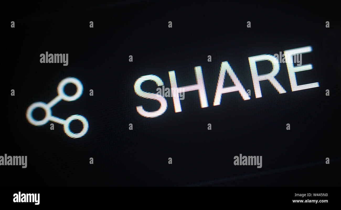 Share icon on computer display Stock Photo