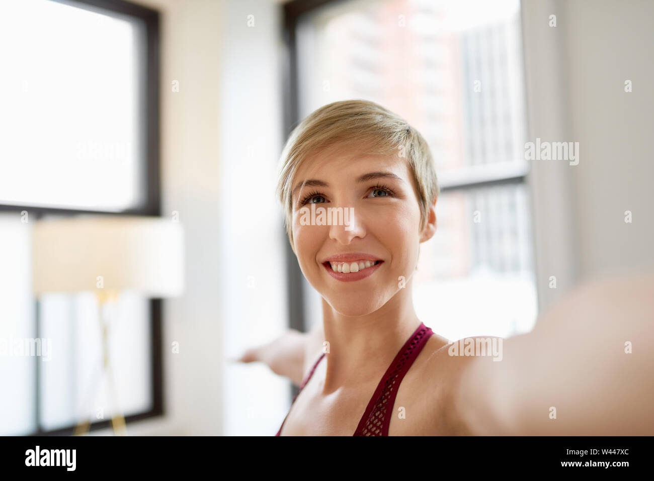 Millennial Healthy Girl With Short Hair Relaxing While Doing The