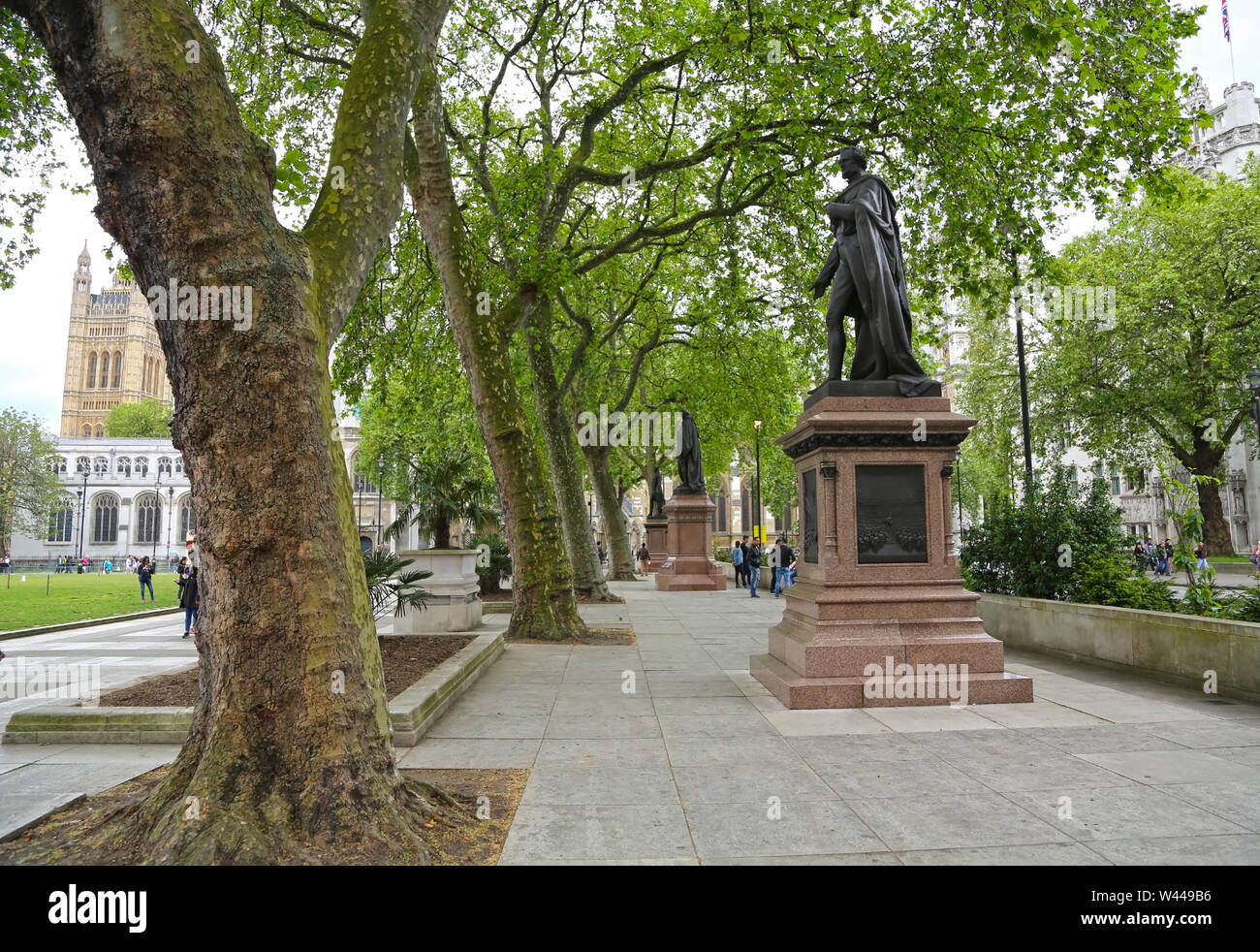 London, Great Britain -May 22, 2016: statues to Edward Geoffrey Smith Stanley and Benjamin Disraeli  in the Parliament Square Stock Photo