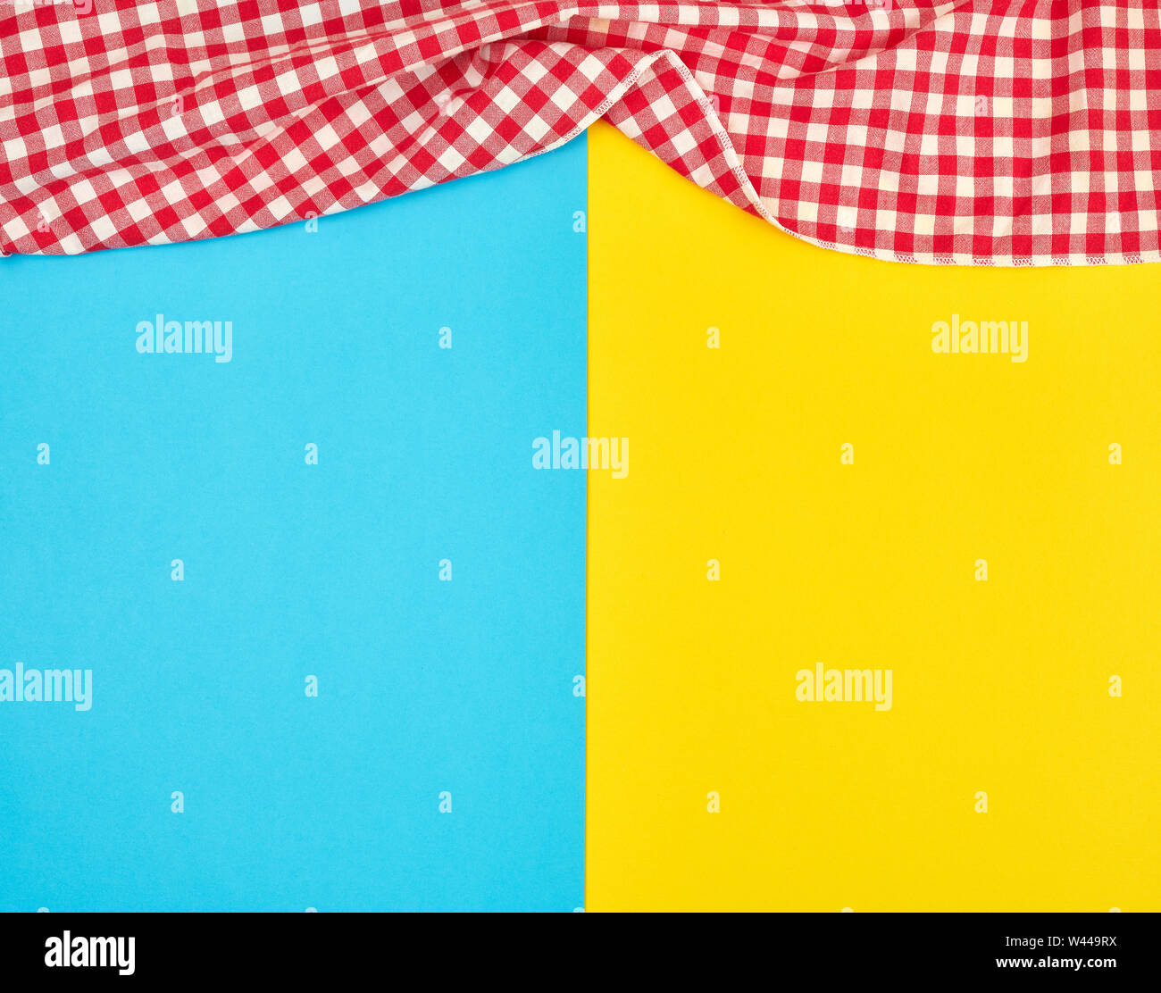 White Red Checkered Kitchen Towel On A Blue Yellow Background