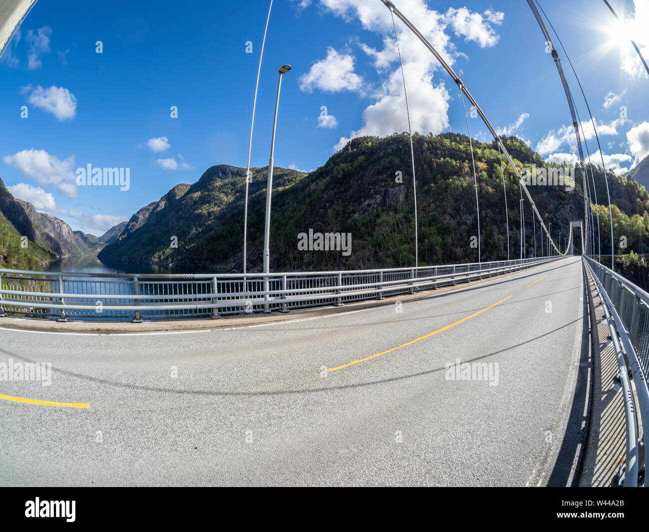 Suspension bridge over the Erfjord, fisheye view, touristic road Ryfylkeveien, RV 13, Norway. Stock Photo