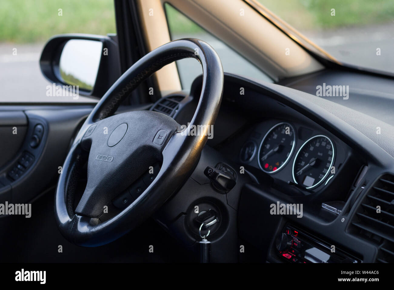 Usual car inside. Interior details of well maintained vehicle. View on