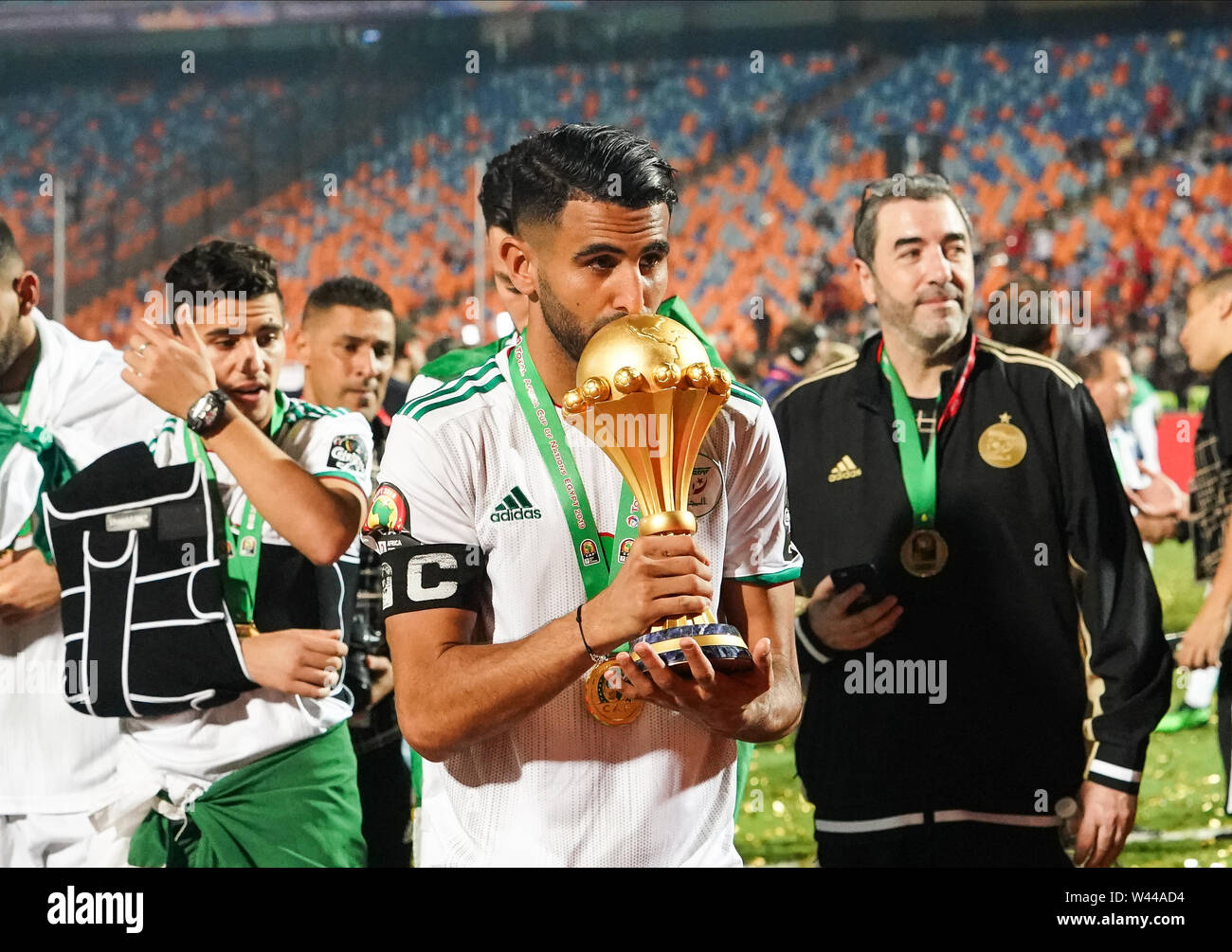 Cairo, Algeria, Egypt. 19th July, 2019. FRANCE OUT July 19, 2019: Riyad Karim Mahrez of Algeria with the trophy after the Final of 2019 African Cup of Nations match between Algeria and Senegal at the Cairo International Stadium in Cairo, Egypt. Ulrik Pedersen/CSM/Alamy Live News Stock Photo