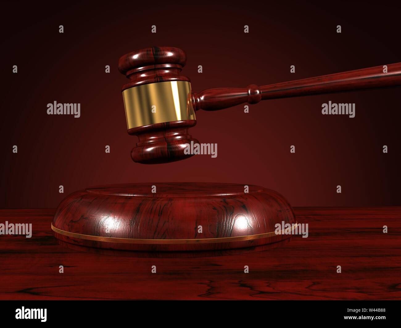 Judge gavel isolated on brown background. Stock Photo