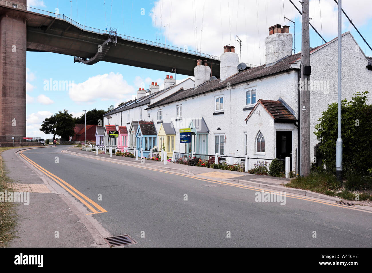 A row of houses/cottages on the Hessle Foreshore below the Humber Bridge Stock Photo