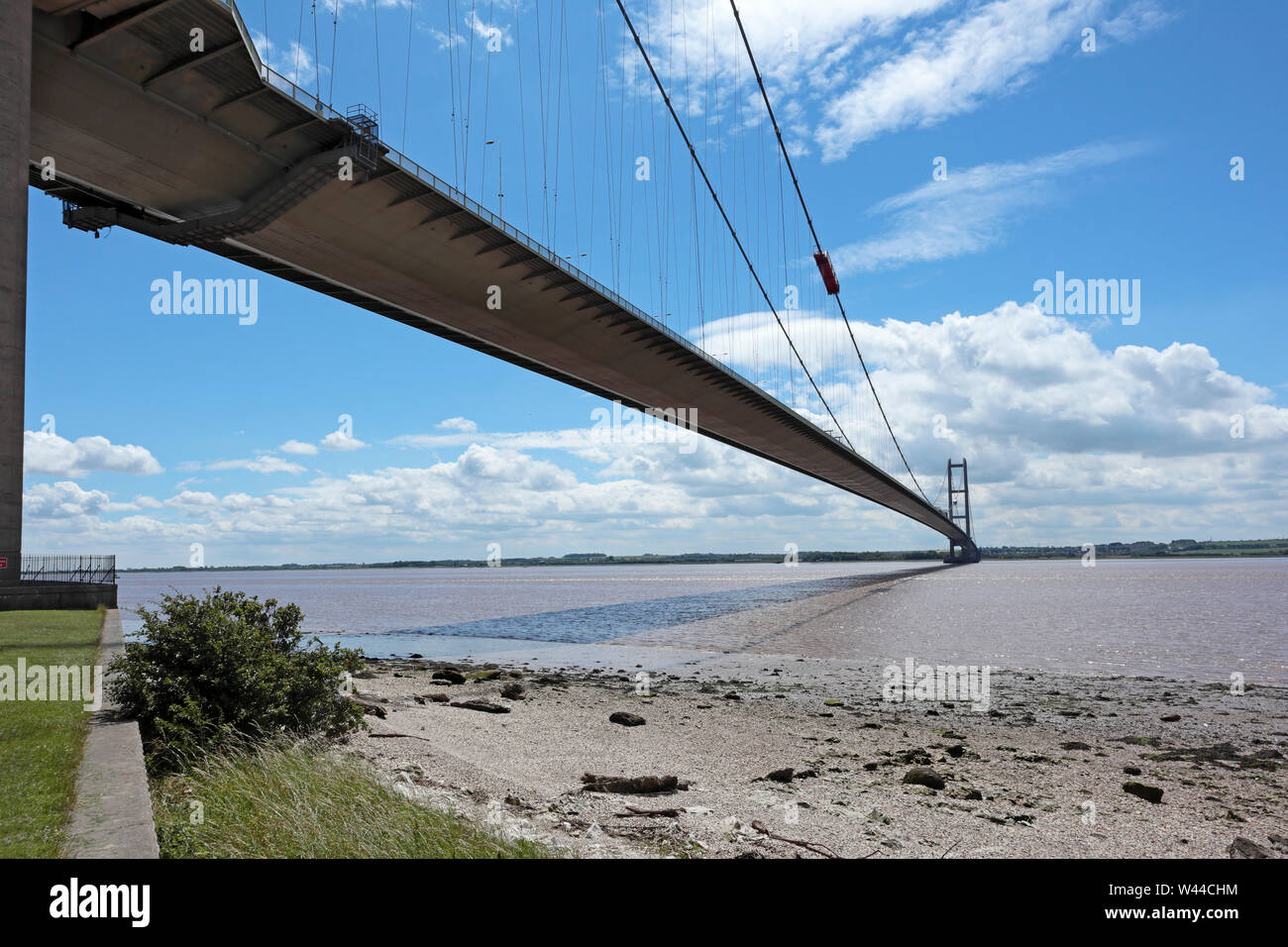 View south along the Humber Bridge from below on Hessle Foreshore, north bank to south bank. Stock Photo