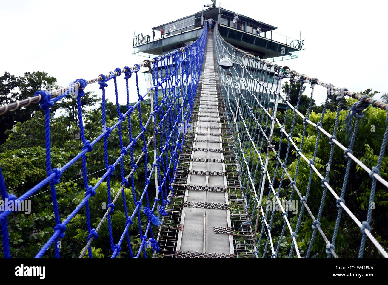 ANTIPOLO CITY, PHILIPPINES – JULY 17, 2019: Hanging bridge which leads to a 360 degree viewing deck at a restaurant and tourist destination in Antipol Stock Photo