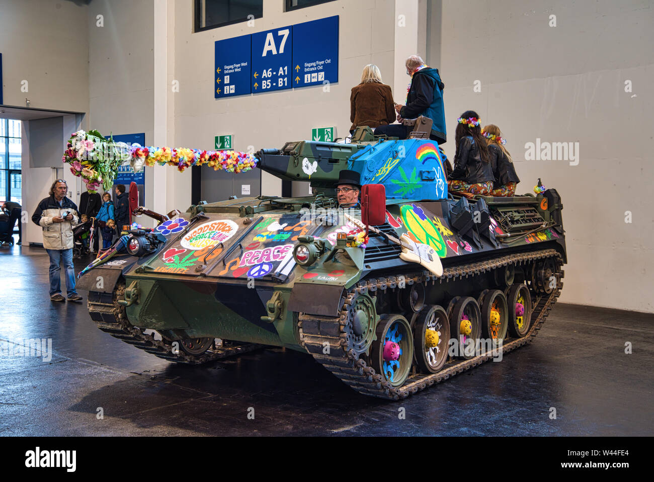 FRIEDRICHSHAFEN - MAY 2019: hippies on the tank painted with colors at  Motorworld Classics Bodensee on May 11, 2019 in Friedrichshafen, Germany  Stock Photo - Alamy