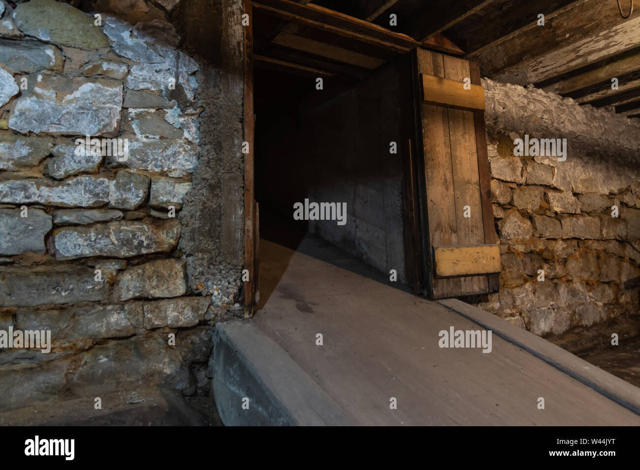 Old concrete loading chute in warehouse basement Stock Photo Alamy