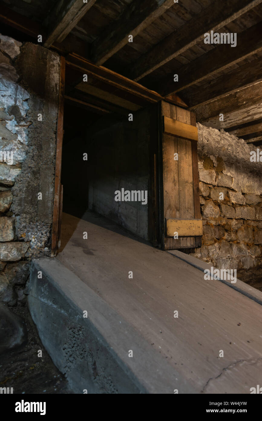 Old concrete loading chute in warehouse basement Stock Photo Alamy