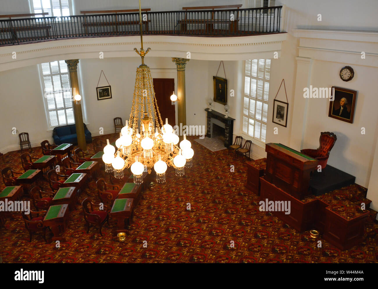 View from the balcony of the decorative chandiler hanging Inside the historic Alabama State capitol Senate Chambers in Montgomery, AL Stock Photo