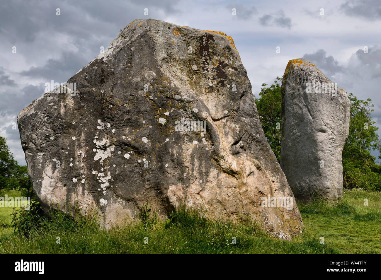 Large female and tall male Cove stones in the northern inner circle of Avebury Henge largest neolithic stone circe in the world Avebury Village Englan Stock Photo