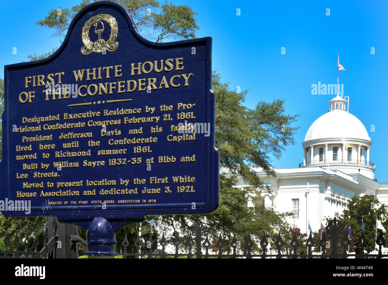 A prominent historical sign in front of the First White House of the Confederacy is located near the State Capitol in Montgomery,  AL Stock Photo