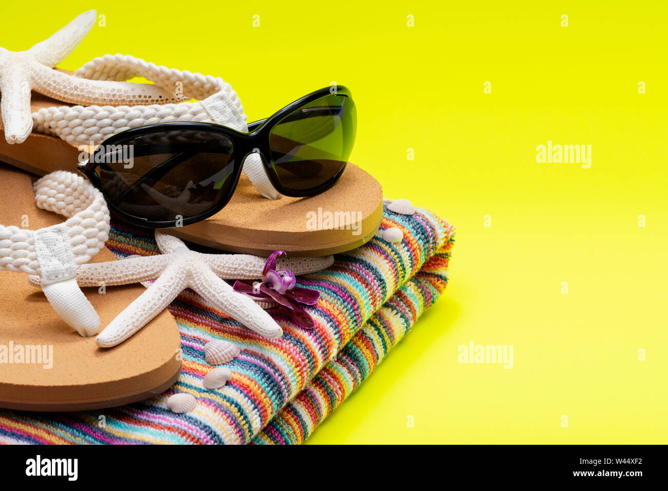 Women's Beach Flip Flops, Colorful Striped Beach Towels and black ...