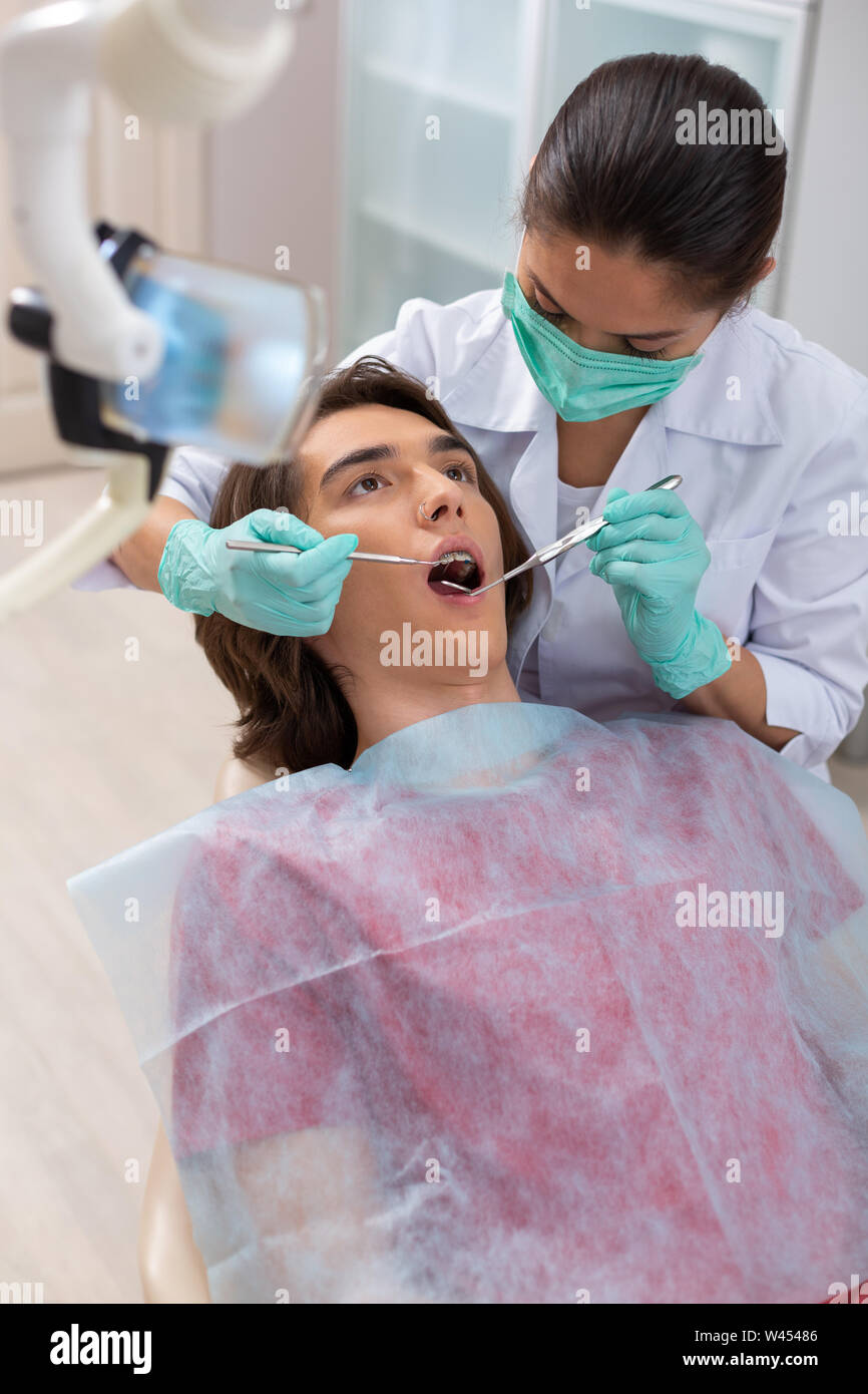 Doctor green lab coat hi-res stock photography and images - Alamy