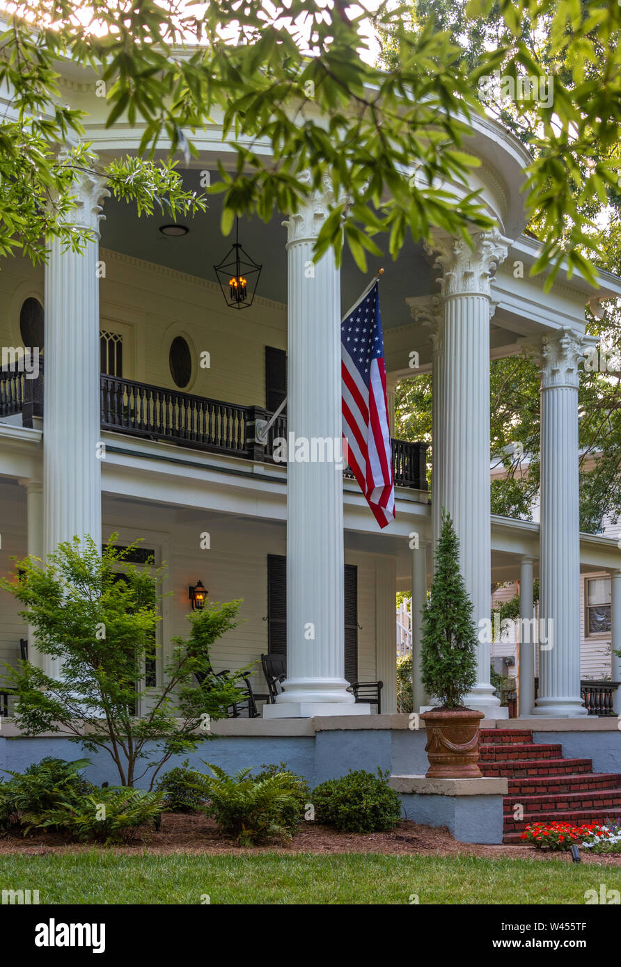 The Charters-Smith House on historic Green Street in Gainesville, Georgia is a neo-classical style residence (now home to a business) built in 1906. Stock Photo