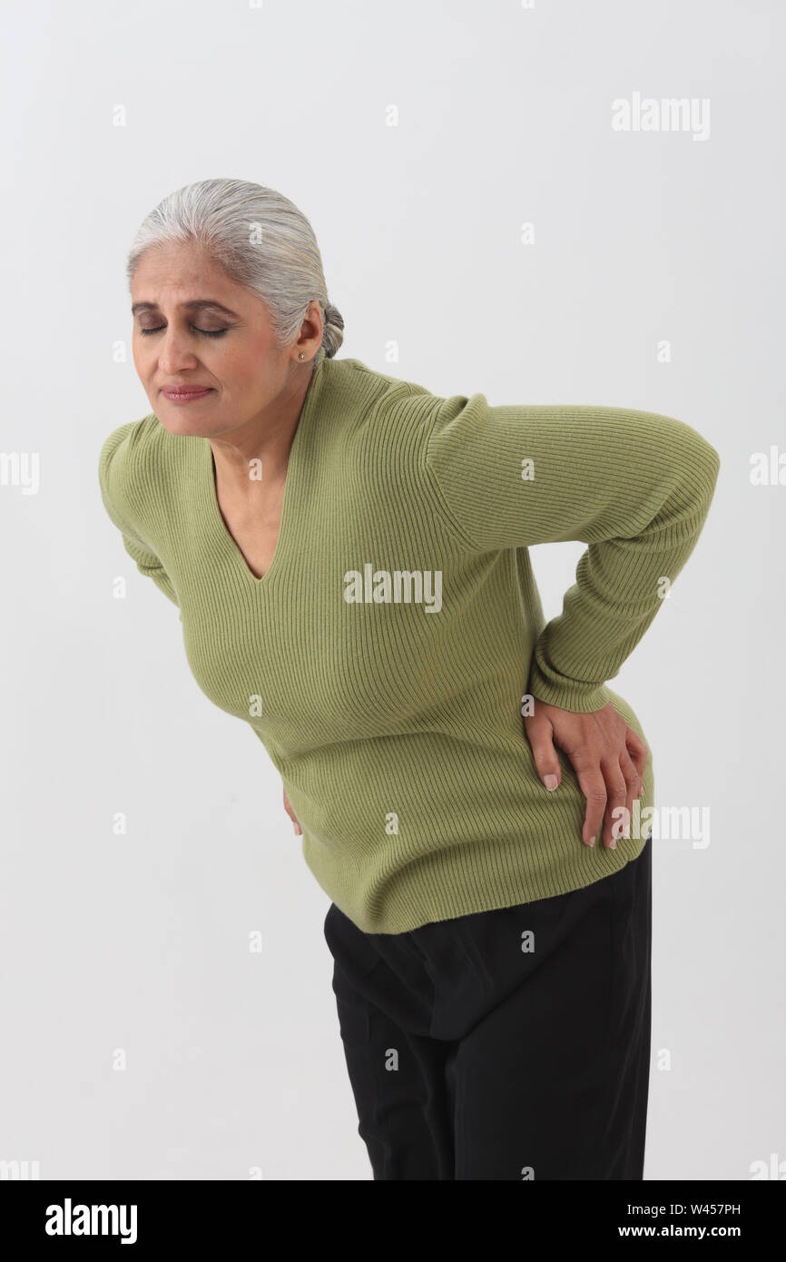 Woman backache old older hi-res stock photography and images - Alamy