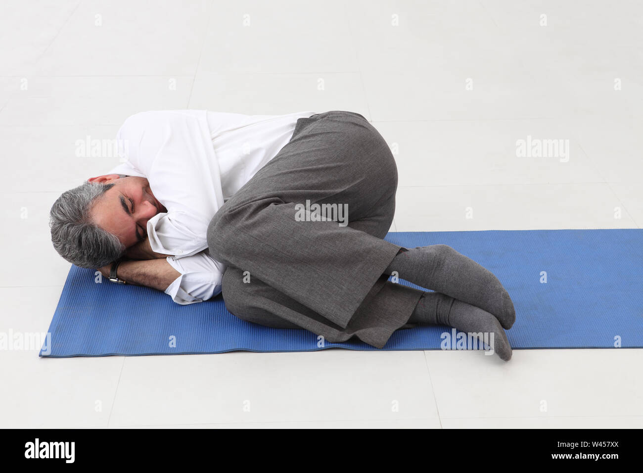 Businessman Sleeping On Floor Mat Stock Photo 260730146 Alamy