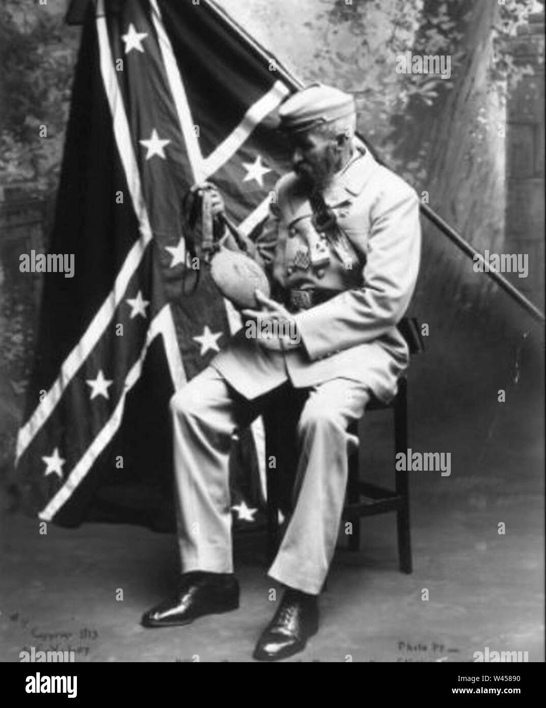 Confederate soldier & battle flag. Stock Photo